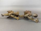 pair of antique brass figurines of birds on branch