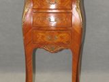 an image of a small chest of drawers with a marble top