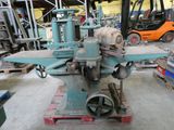 a machine that is sitting on a pallet in a warehouse