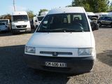 a white van that is parked in a parking lot
