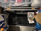 a box with a camera and a dvd inside of it