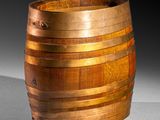 a wooden barrel that is sitting on a table