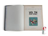an open book with a picture of a plane on it