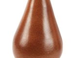 a brown vase that is sitting on a white surface