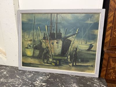 une photo d'un tableau représentant un bateau posé sur une table