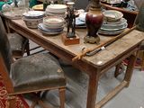 a table that has a lot of plates and bowls on it