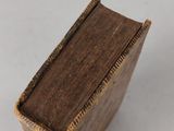 a small wooden box that is sitting on a table