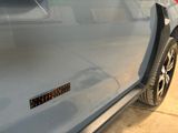 a close up of a car door with a sticker on it
