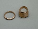 two rings that are sitting next to each other on a table