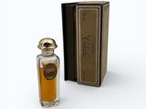 an image of a bottle of perfume sitting next to a box