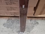 a cardboard box that is sitting on the floor next to a door