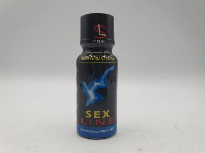 a close up of a bottle of sex line on a white surface