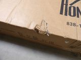 a cardboard box with a logo on it sitting on the floor