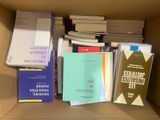 a box full of books that are sitting on a table