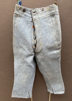 an image of a pair of jeans hanging on a wall