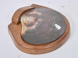 a wooden coaster with a picture of a dog on it