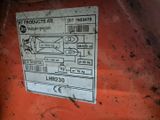 l'étiquette située à l'arrière du tracteur est clairement visible