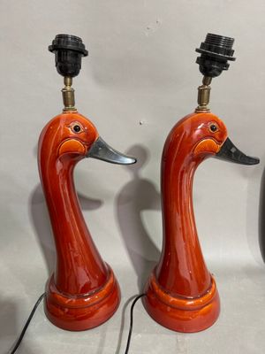 two lamps that are sitting on a table
