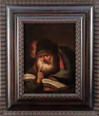 painting of an old man reading a book in a wooden frame