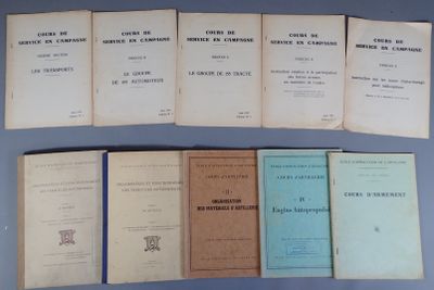 several books are lined up on a table with a blue background