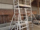 a ladder that is sitting in the middle of a building