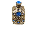 an image of a blue glass perfume bottle sitting on top of a white surface