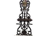 an image of a clock on a stand with snow on the ground
