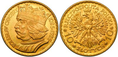 a close up of two gold coins on a white background