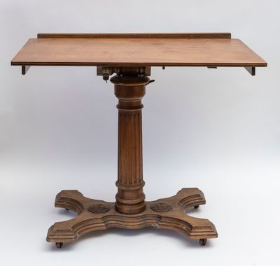 a wooden table with a wooden top and a wooden base