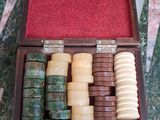a wooden box filled with different types of soaps