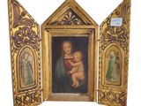 an image of a painting of a woman holding a baby in a gold frame