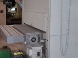an image of a white refrigerator in a garage