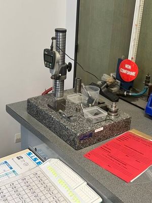 an image of a lab with a microscope on a counter