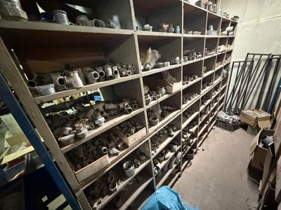 a room with shelves full of different types of tools
