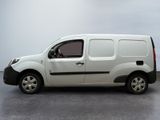 a small white van parked in a parking lot