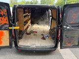 a van that has been vandalized with graffiti on it