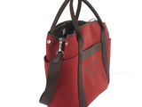 the red and brown tote bag has a zippered handle