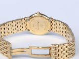 an image of a close up of a wrist watch on a white surface