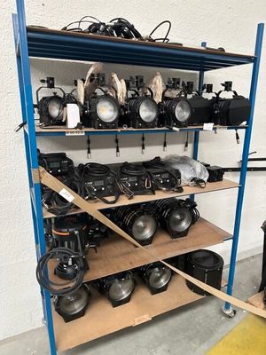 a shelf with many different types of lights on it