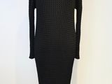 une robe-pull noire sur un mannequin, un mannequin, un mannequin, un mannequin, un mannequin, un mannequin, un mannequin, un mannequin, un mannequin, un mannequin, un mannequin, un mannequin, un mannequin, un mannequin, un mannequin, un mannequin, un mannequin, un mannequin, un mannequin, un mannequin, un mannequin, un mannequin, un mannequin, un mannequin, un mannequin, un mannequin, un mannequin, un mannequin, un mannequin, un mannequin, un mannequin, un mannequin, un