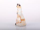 a figurine of a woman dressed in a wedding dress