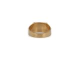 a close up of a gold ring on a white background