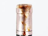 a close up of a bottle of wine on a table