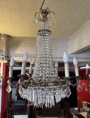 a chandelier hanging from the ceiling in a store
