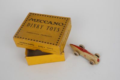 a small toy car in a box with a small toy car in it