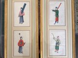 two framed pictures of a man with a sword and a woman with a sword