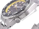 a close up of a watch on a metal bracelet