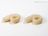two pieces of food that are sitting on a table