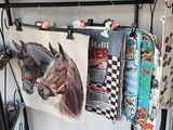 a picture of a clothes rack with a horse on it