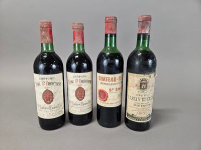 three bottles of wine are lined up on a table
